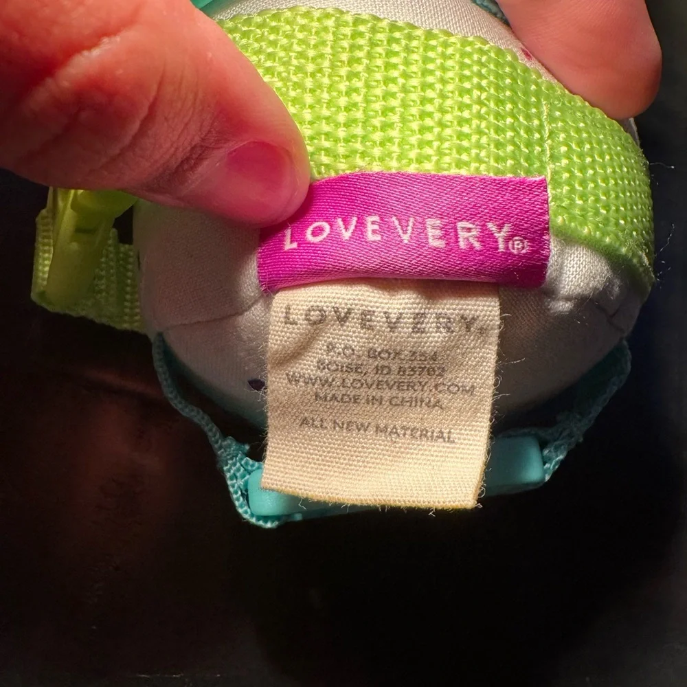 Lovevery The Buckle Barrel Toy